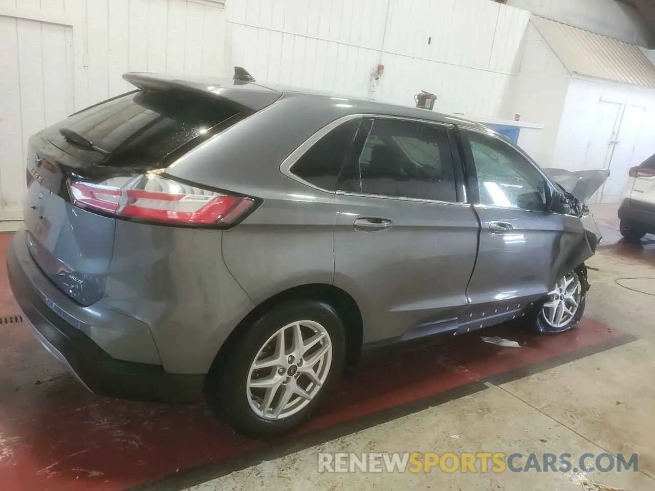 3 fotografías del automóvil dañado 2FMPK4J96PBA21713 FORD EDGE 2023
