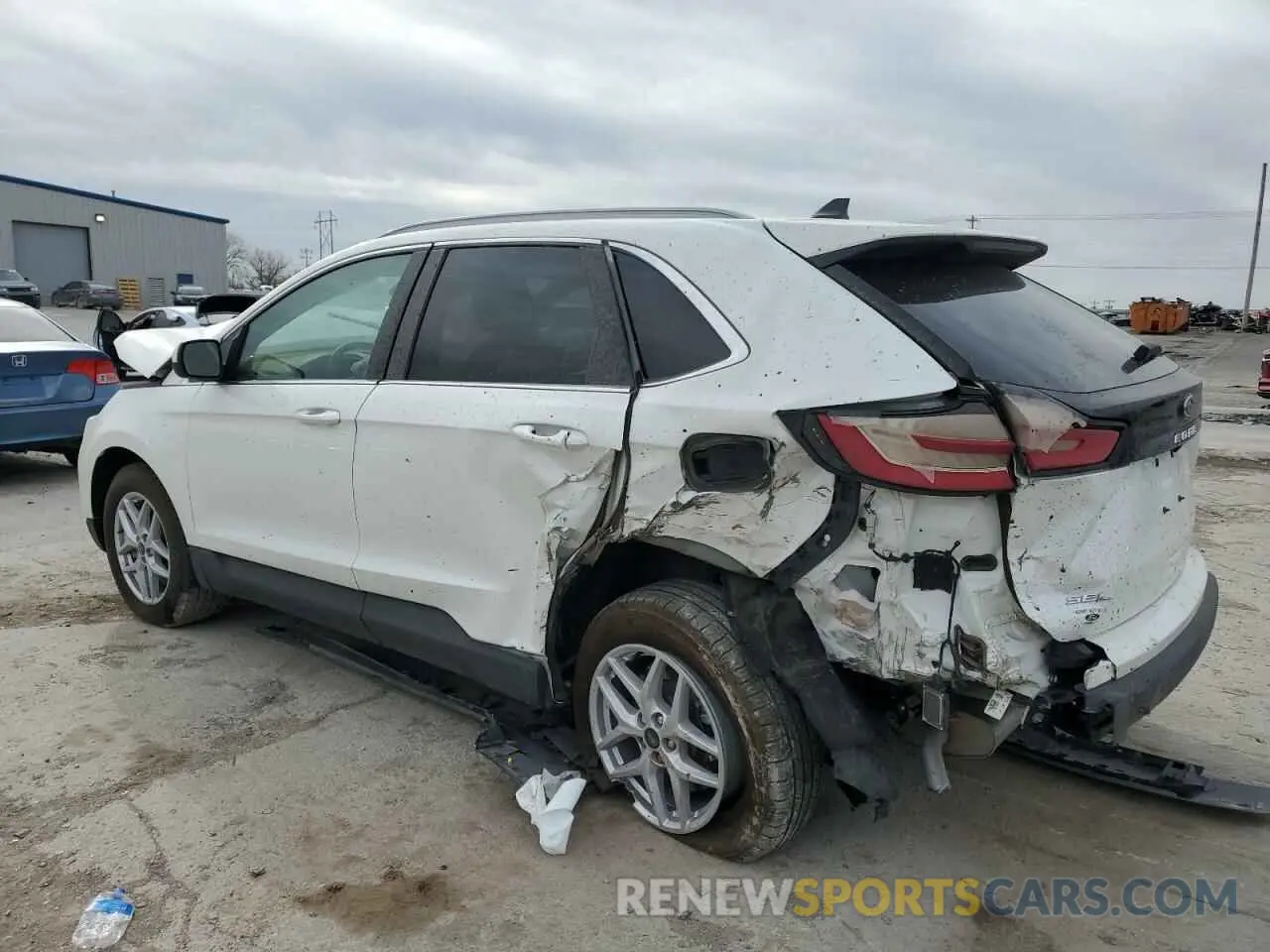 2 fotografías del automóvil dañado 2FMPK4J98PBA51277 FORD EDGE 2023