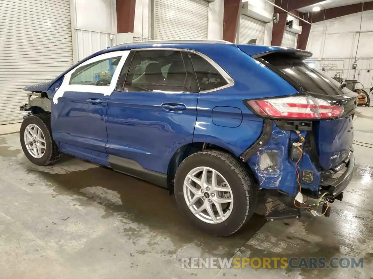 2 fotografías del automóvil dañado 2FMPK4J99PBA08423 FORD EDGE 2023