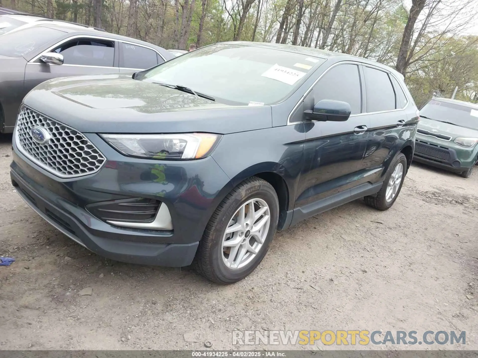 2 fotografías del automóvil dañado 2FMPK4J9XPBA00539 FORD EDGE 2023