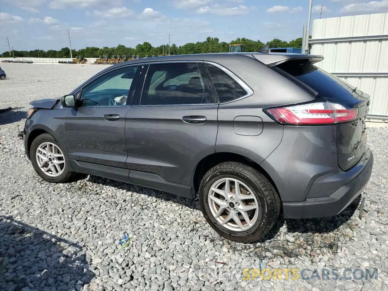 2 fotografías del automóvil dañado 2FMPK4J9XPBA02792 FORD EDGE 2023