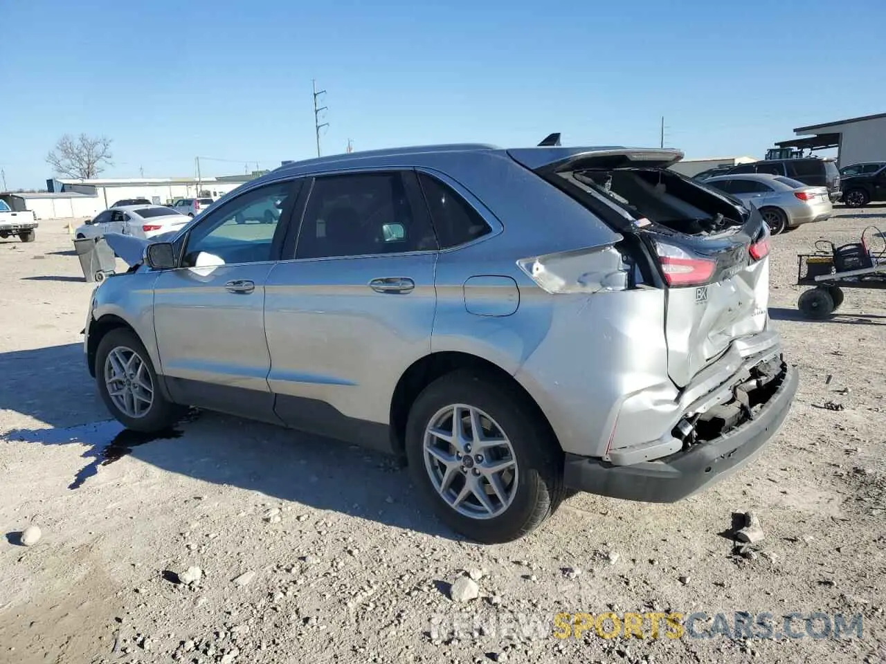 2 fotografías del automóvil dañado 2FMPK4J9XPBA07488 FORD EDGE 2023