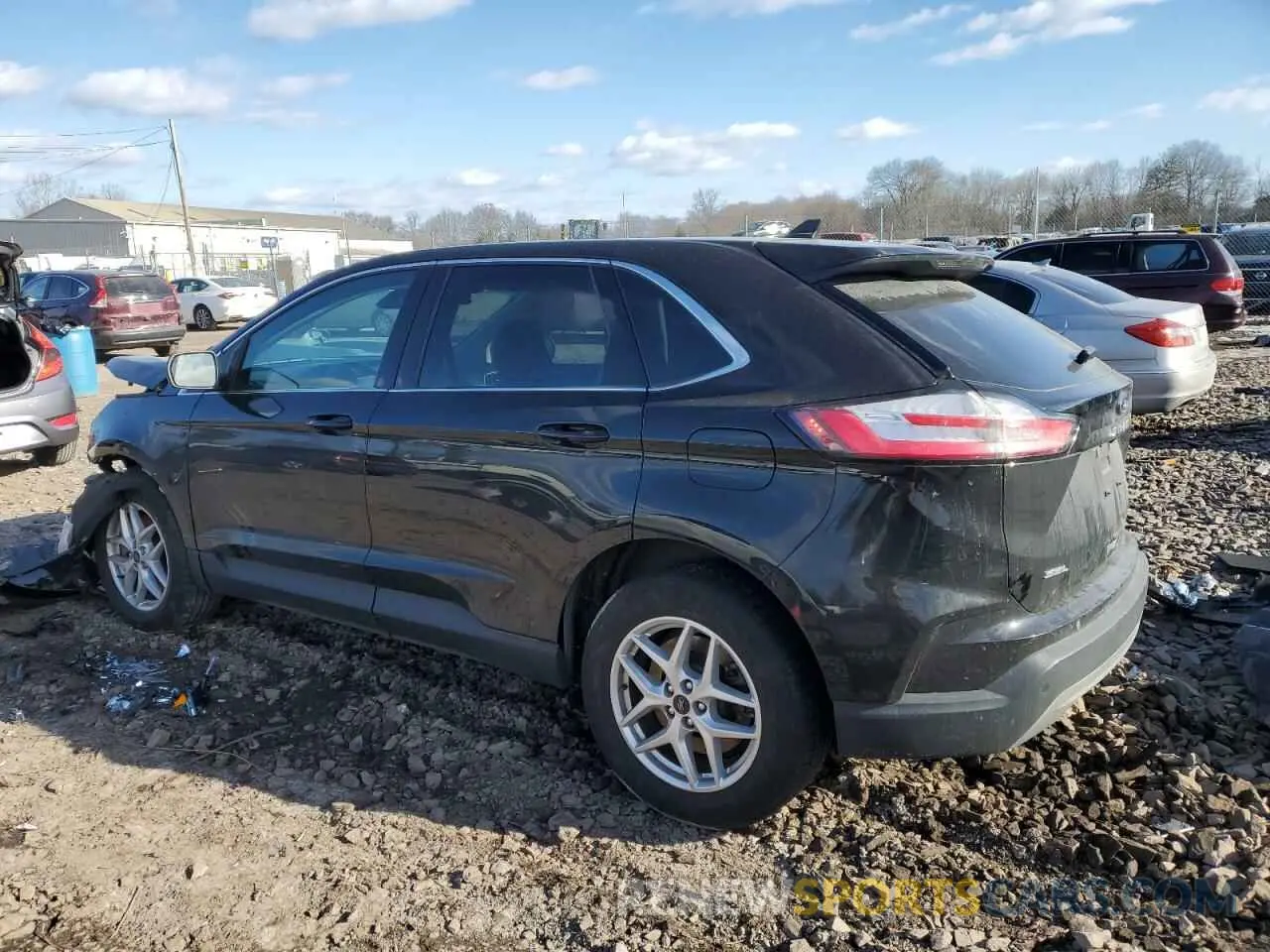 2 fotografías del automóvil dañado 2FMPK4J9XPBA38238 FORD EDGE 2023