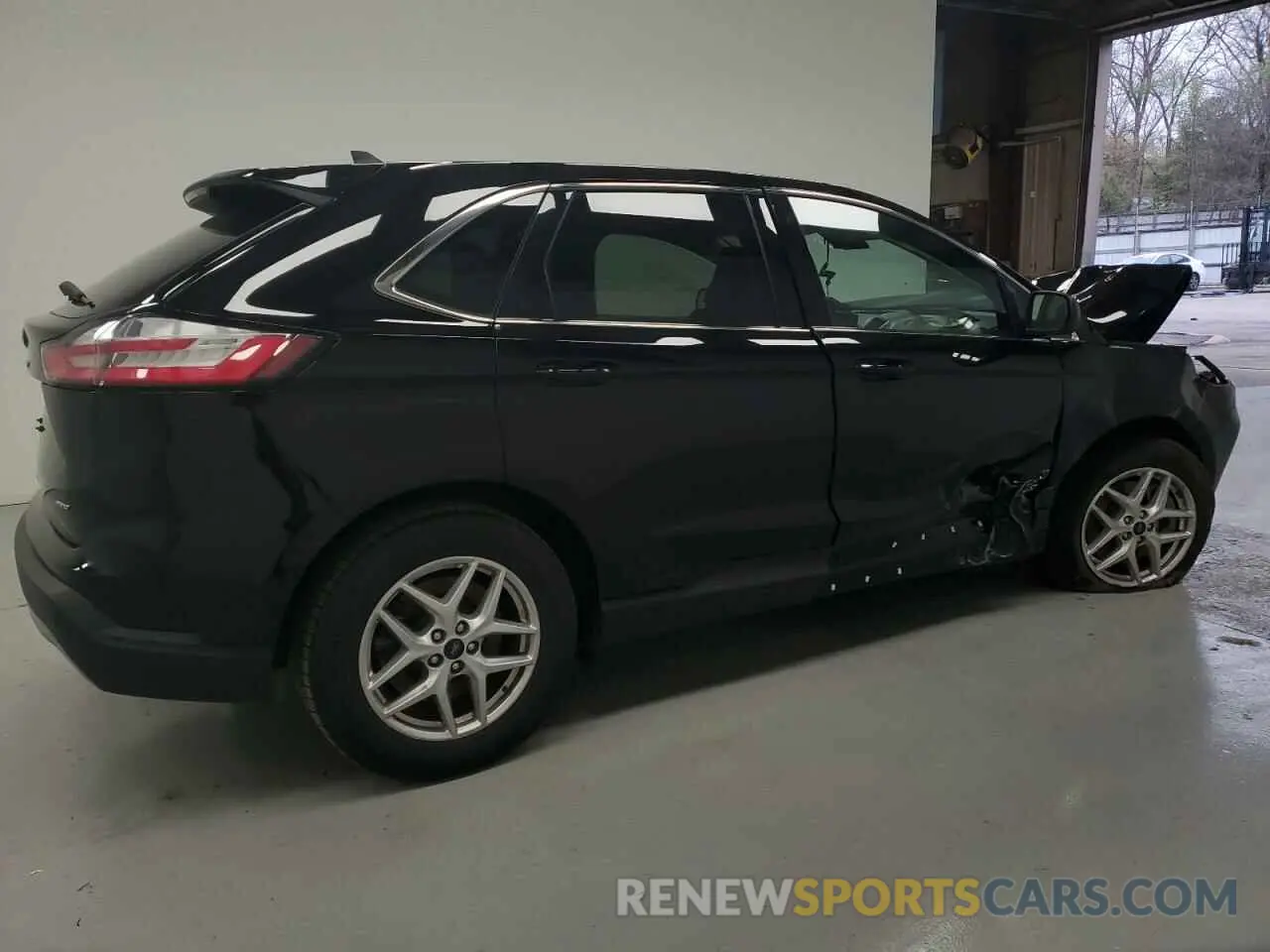 3 fotografías del automóvil dañado 2FMPK4J9XPBA46971 FORD EDGE 2023