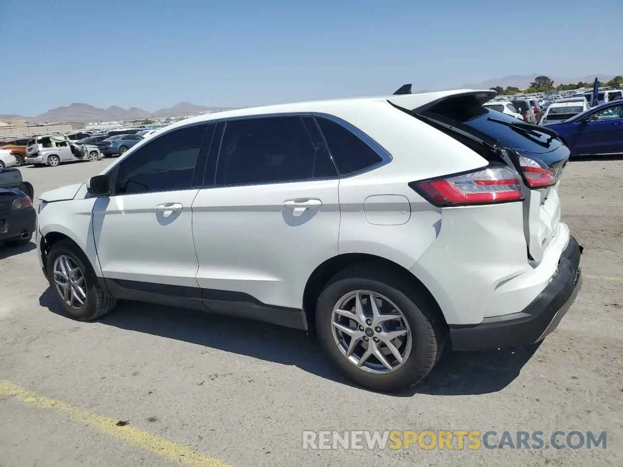 2 fotografías del automóvil dañado 2FMPK4J95RBA30244 FORD EDGE 2024