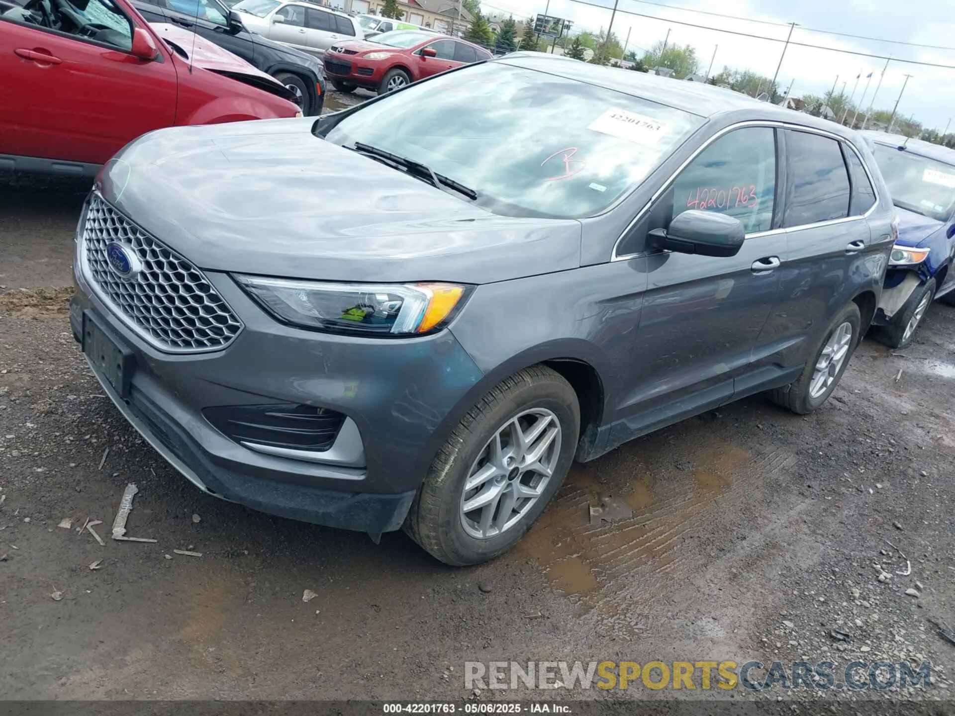 2 fotografías del automóvil dañado 2FMPK4J95RBA98916 FORD EDGE 2024