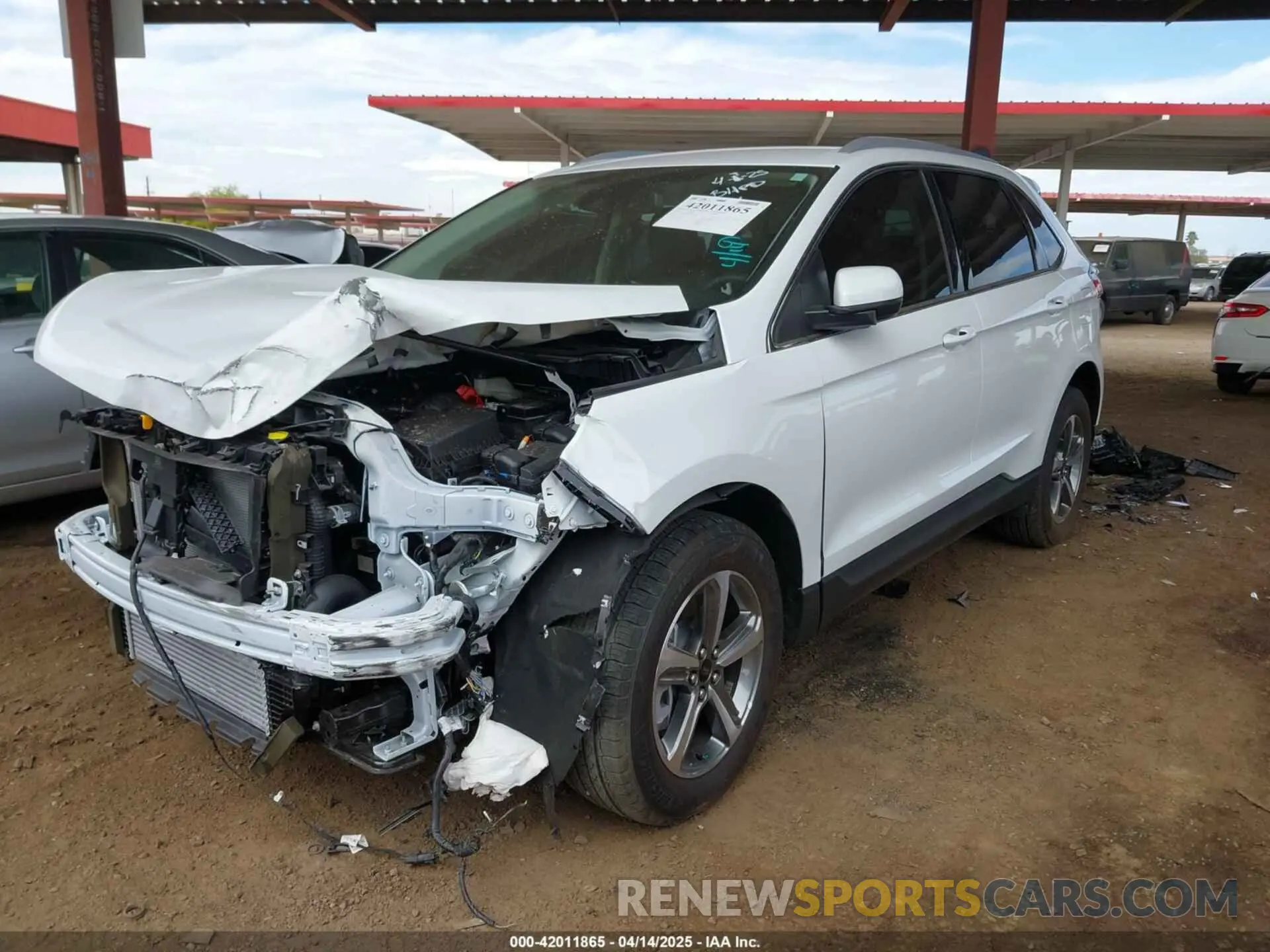 2 fotografías del automóvil dañado 2FMPK4J99RBA55079 FORD EDGE 2024