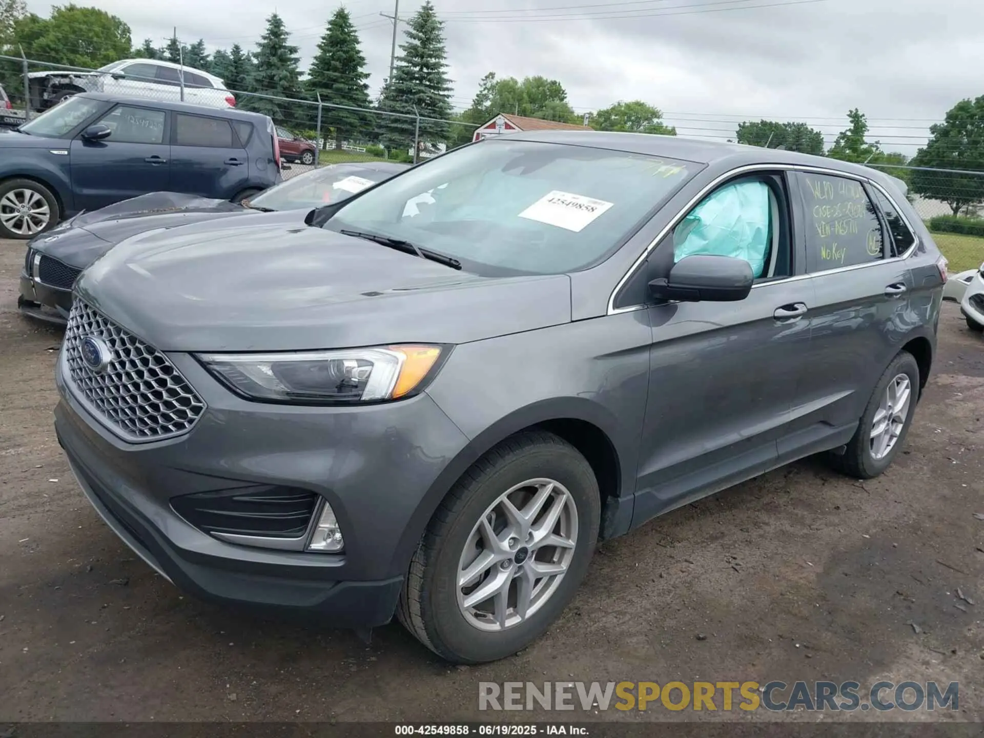 2 fotografías del automóvil dañado 2FMPK4J99RBA65711 FORD EDGE 2024