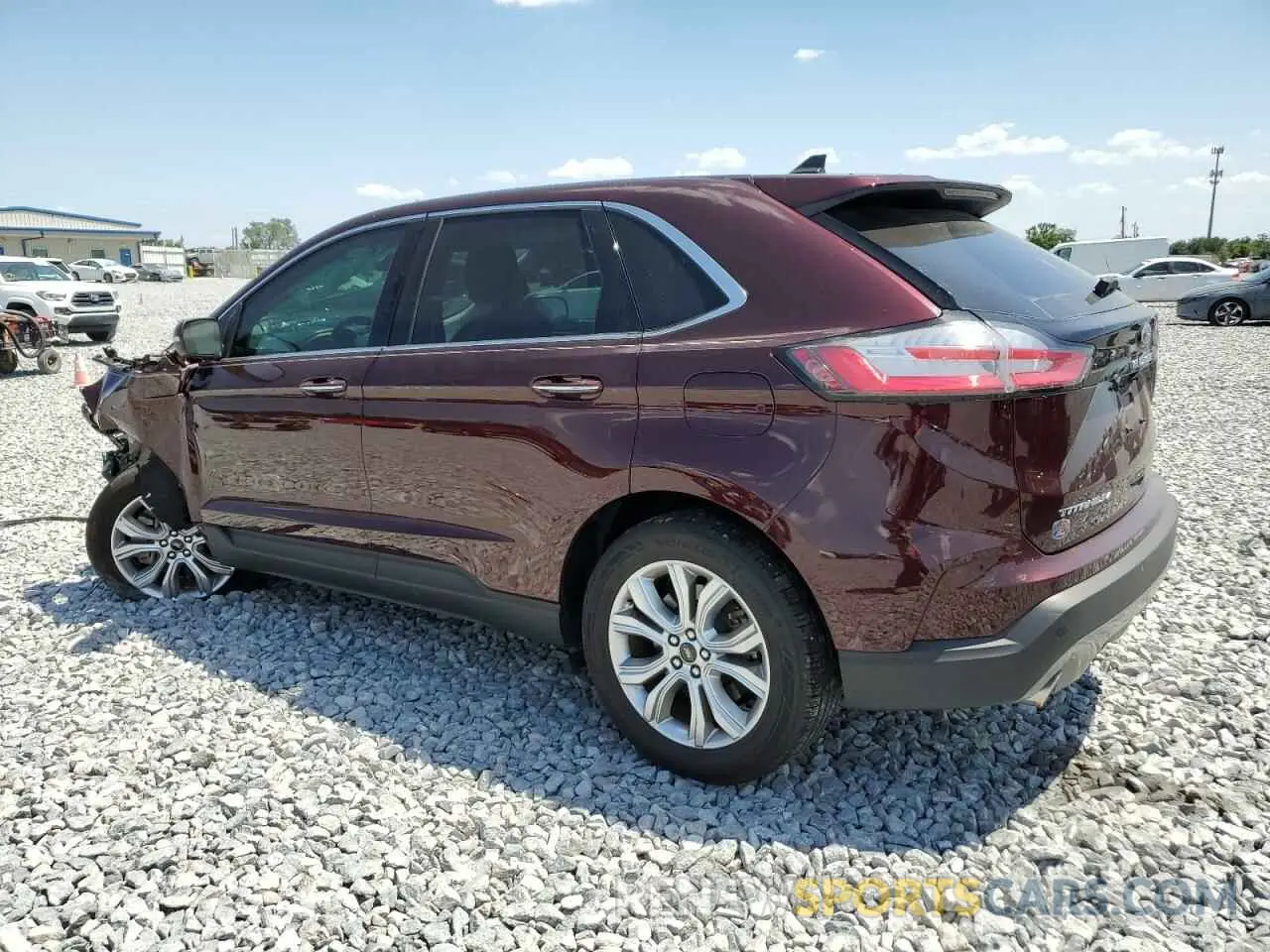 2 fotografías del automóvil dañado 2FMPK4K9XRBA75680 FORD EDGE 2024