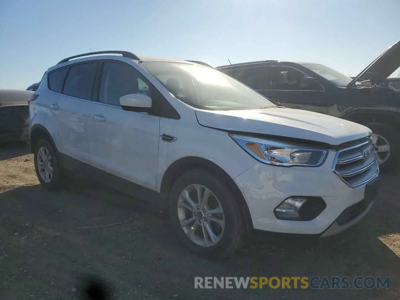 4 fotografías del automóvil dañado 1FMCU9G93KUB34163 FORD ESCAPE 2019