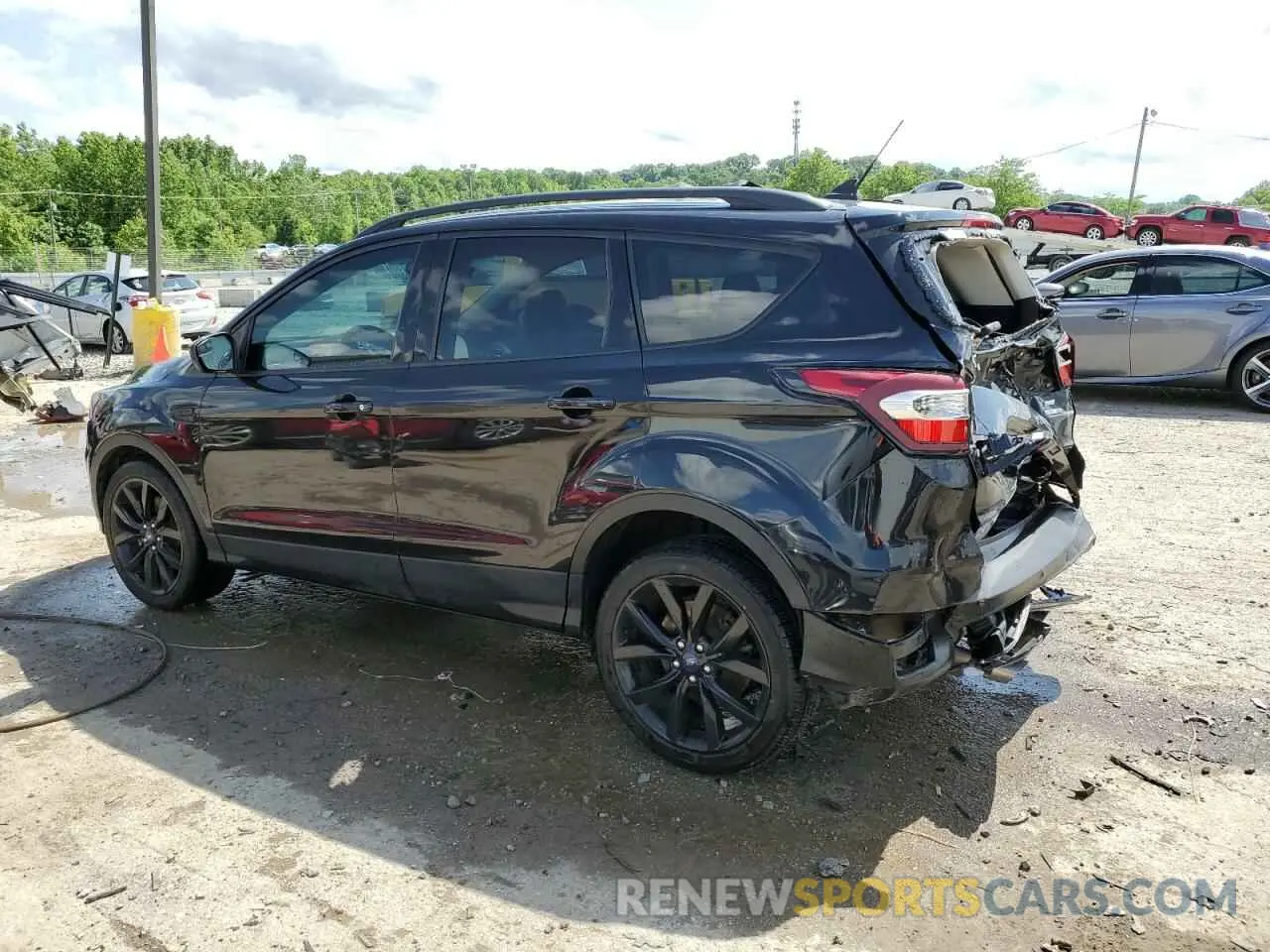 2 fotografías del automóvil dañado 1FMCU9GD2KUB99302 FORD ESCAPE 2019