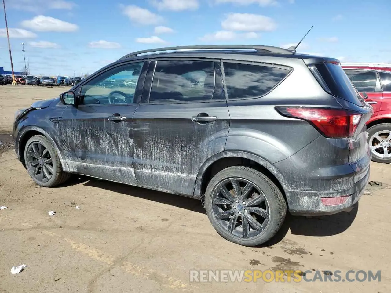 2 fotografías del automóvil dañado 1FMCU9GD9KUA32693 FORD ESCAPE 2019