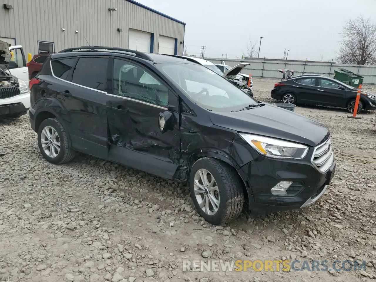 4 fotografías del automóvil dañado 1FMCU9GD9KUA75639 FORD ESCAPE 2019