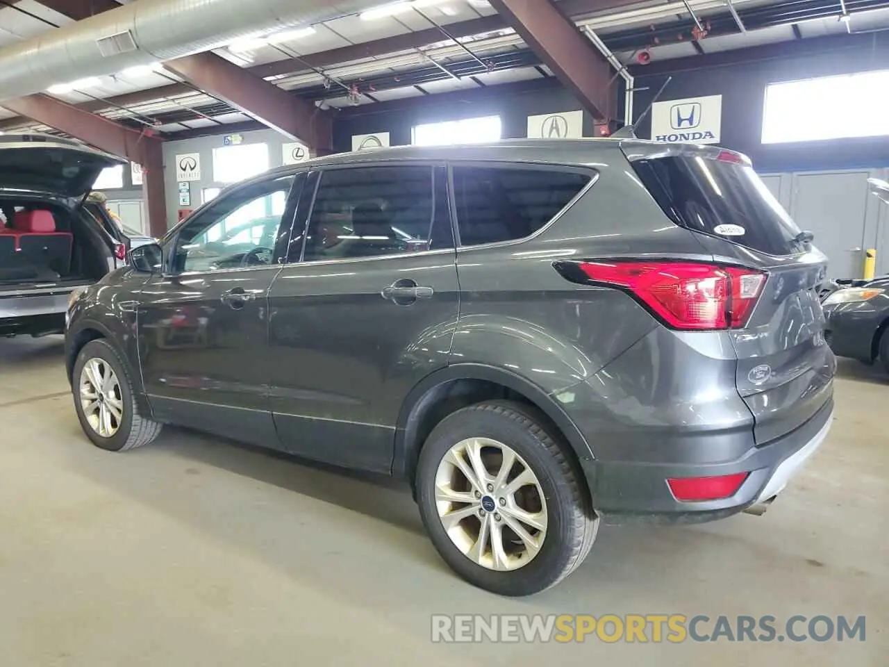 2 fotografías del automóvil dañado 1FMCU9GDXKUB65575 FORD ESCAPE 2019