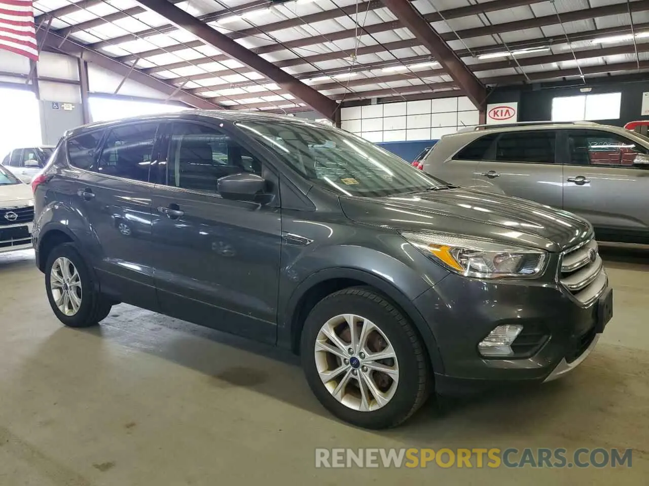 4 fotografías del automóvil dañado 1FMCU9GDXKUB65575 FORD ESCAPE 2019