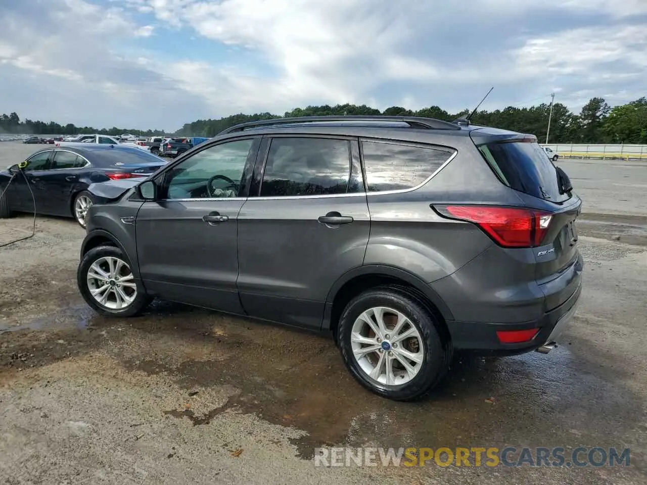 2 fotografías del automóvil dañado 1FMCU9HD6KUB04500 FORD ESCAPE 2019