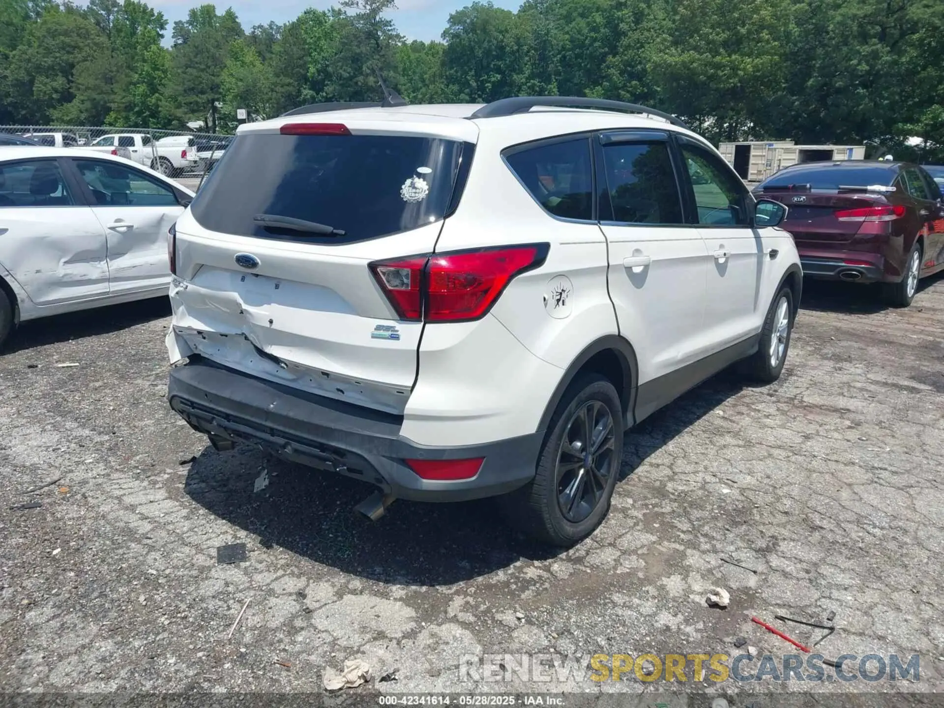 4 fotografías del automóvil dañado 1FMCU9HD6KUB94392 FORD ESCAPE 2019