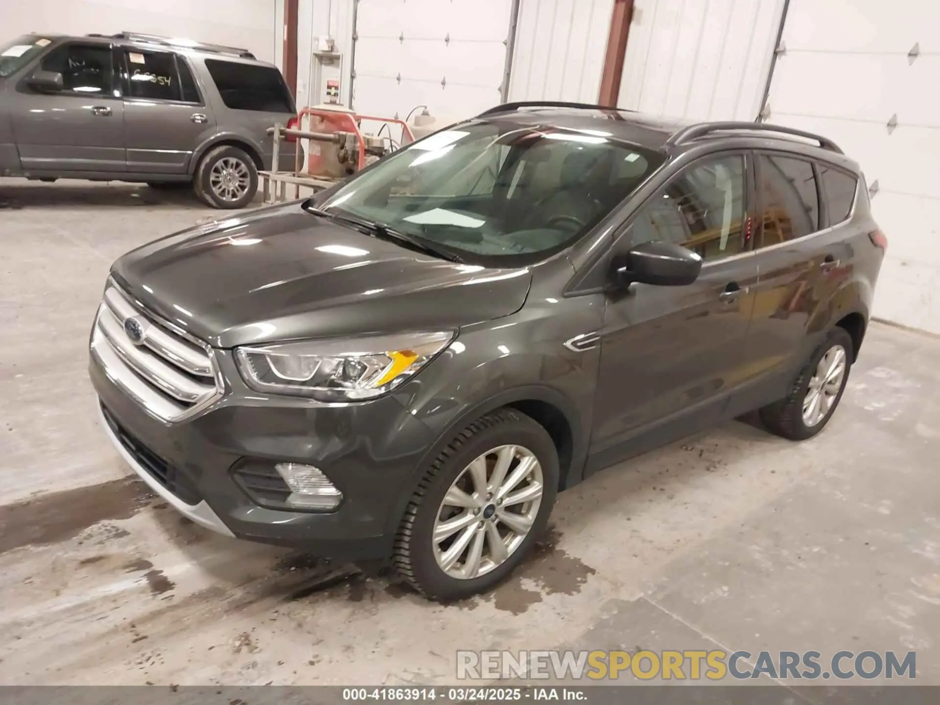 2 fotografías del automóvil dañado 1FMCU9HDXKUA46178 FORD ESCAPE 2019