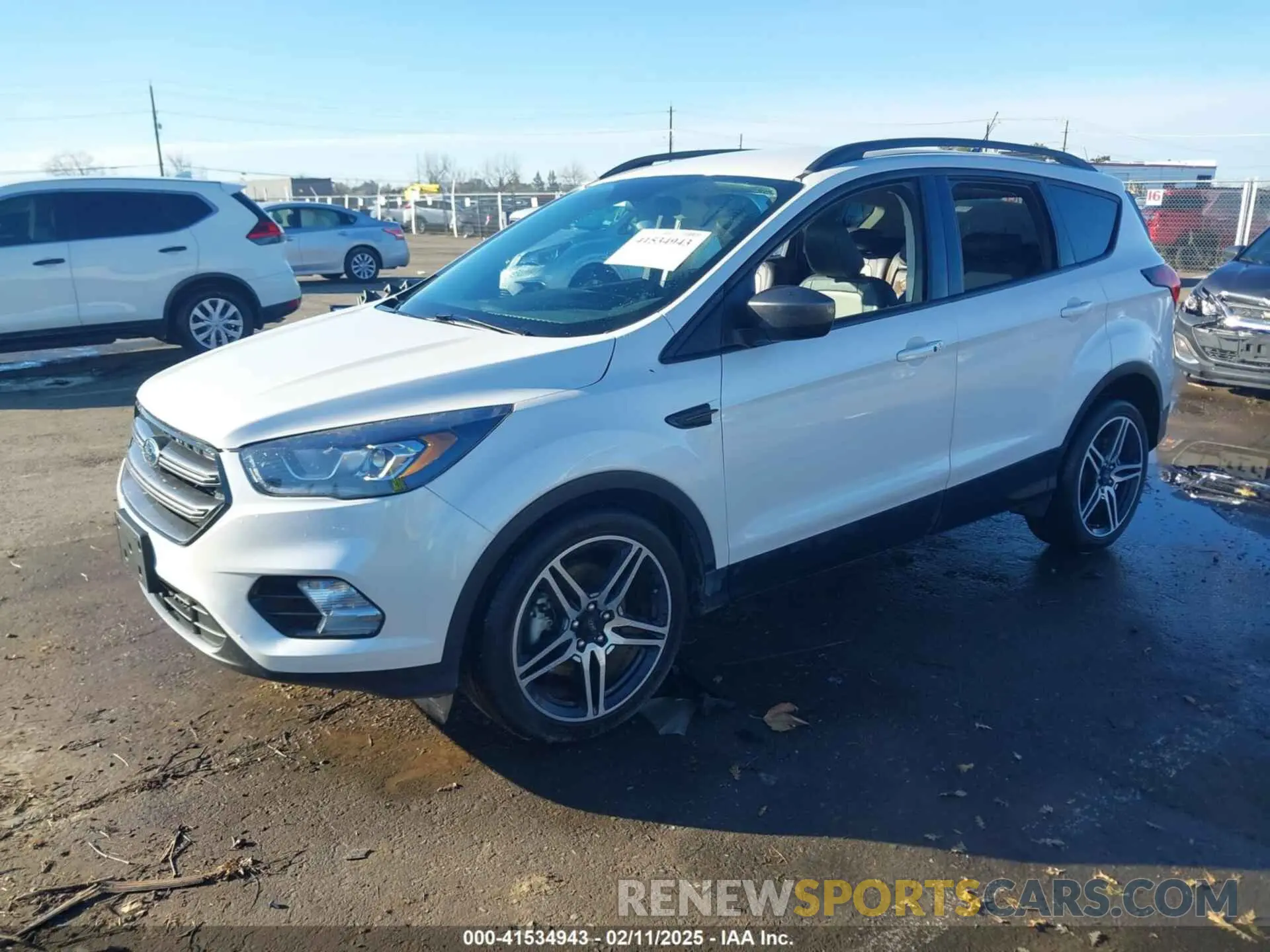 2 fotografías del automóvil dañado 1FMCU9HDXKUC55579 FORD ESCAPE 2019