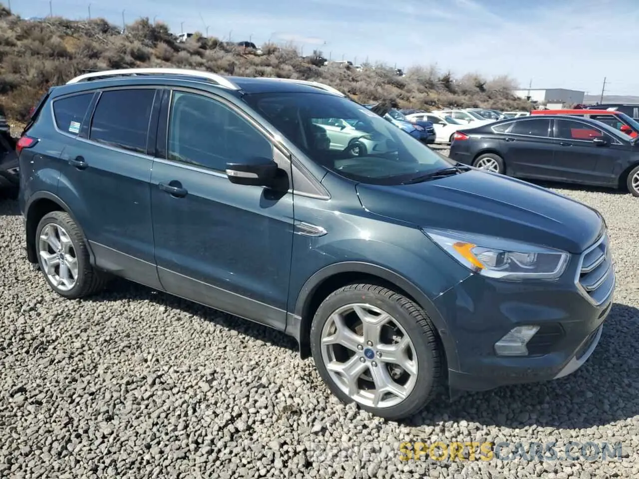 4 fotografías del automóvil dañado 1FMCU9J95KUA32579 FORD ESCAPE 2019