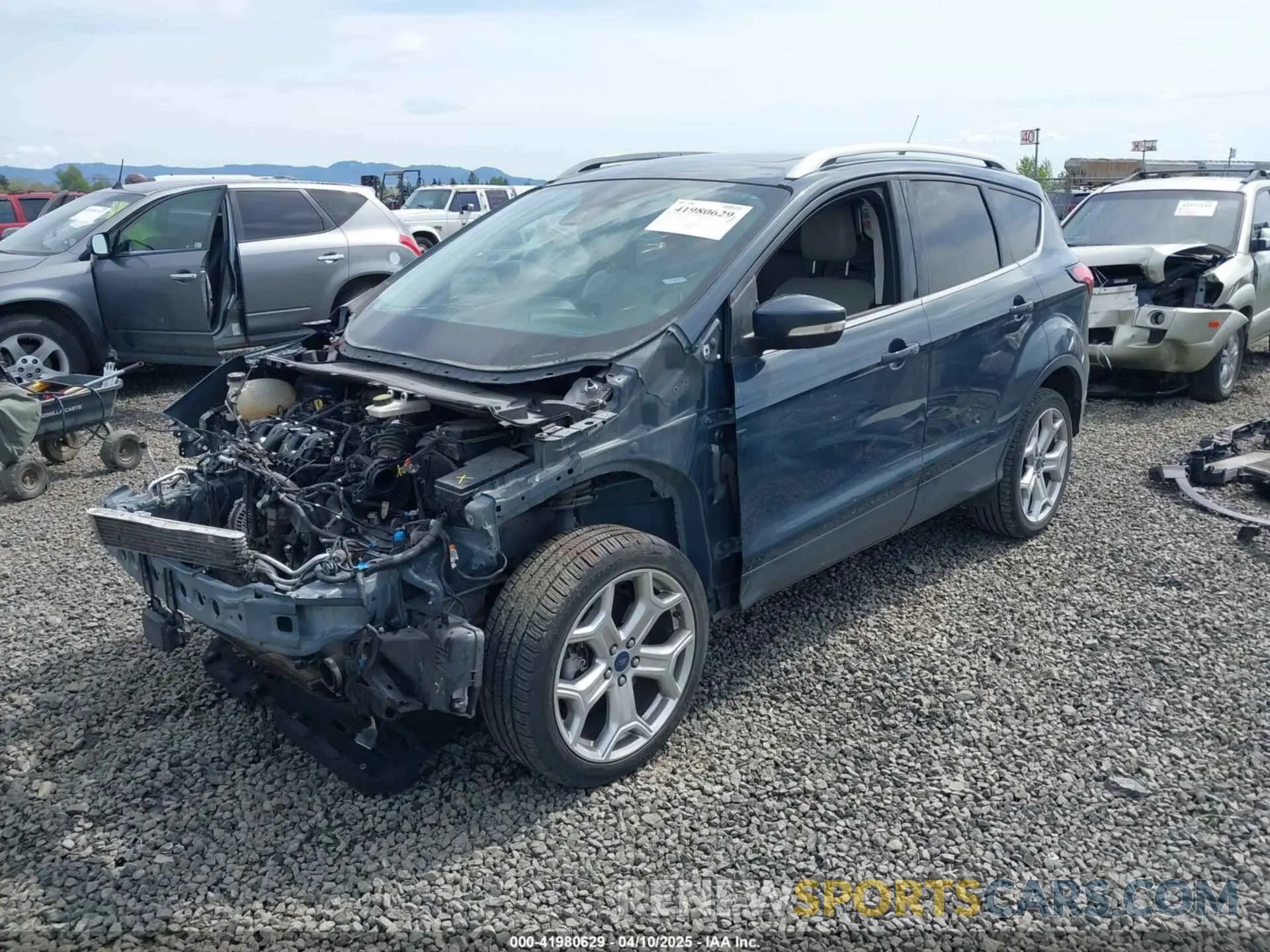 2 fotografías del automóvil dañado 1FMCU9J95KUC05369 FORD ESCAPE 2019