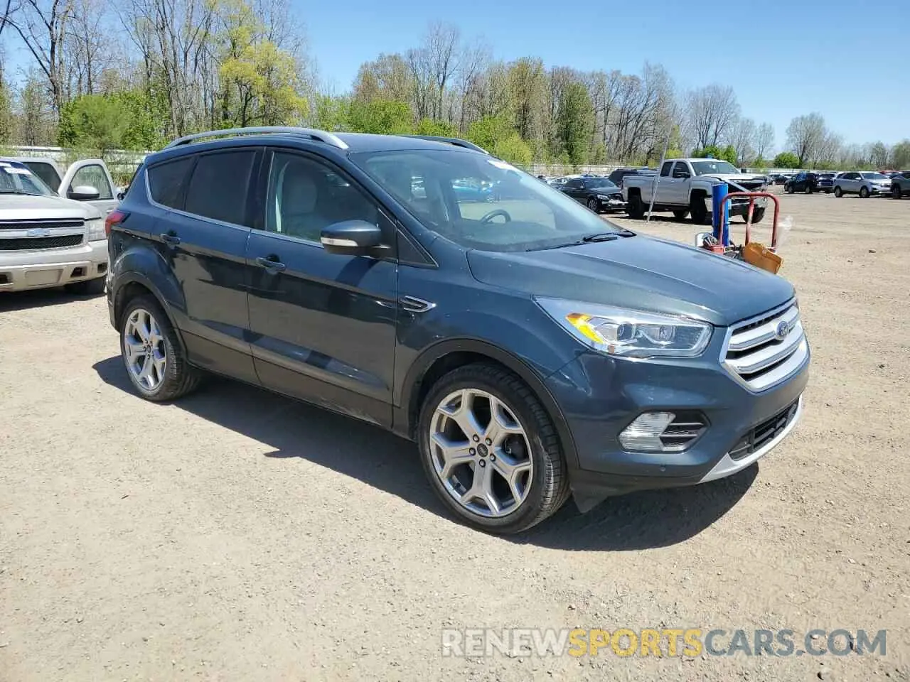 4 fotografías del automóvil dañado 1FMCU9J98KUB54935 FORD ESCAPE 2019