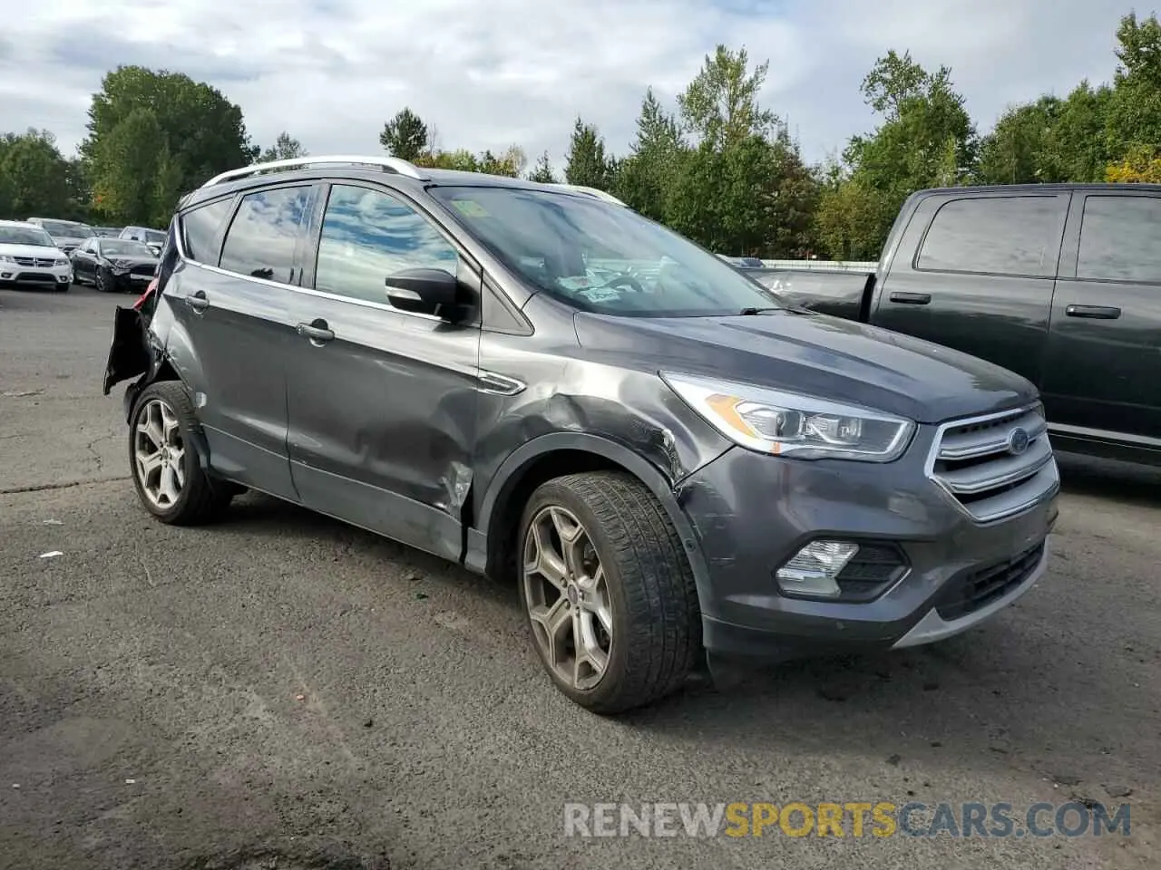4 fotografías del automóvil dañado 1FMCU9J9XKUC32843 FORD ESCAPE 2019