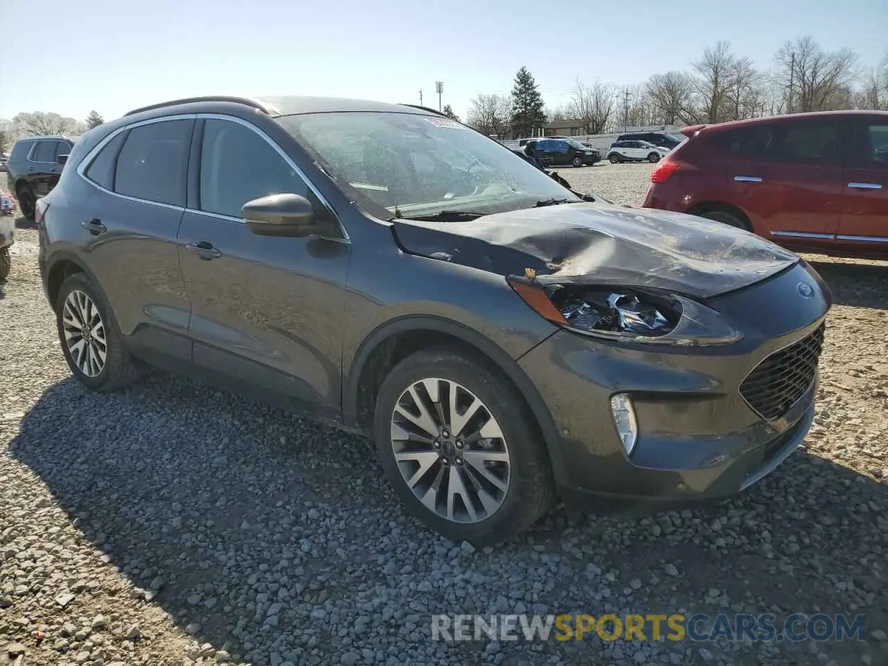 4 fotografías del automóvil dañado 1FMCU9DZ0LUC11478 FORD ESCAPE 2020