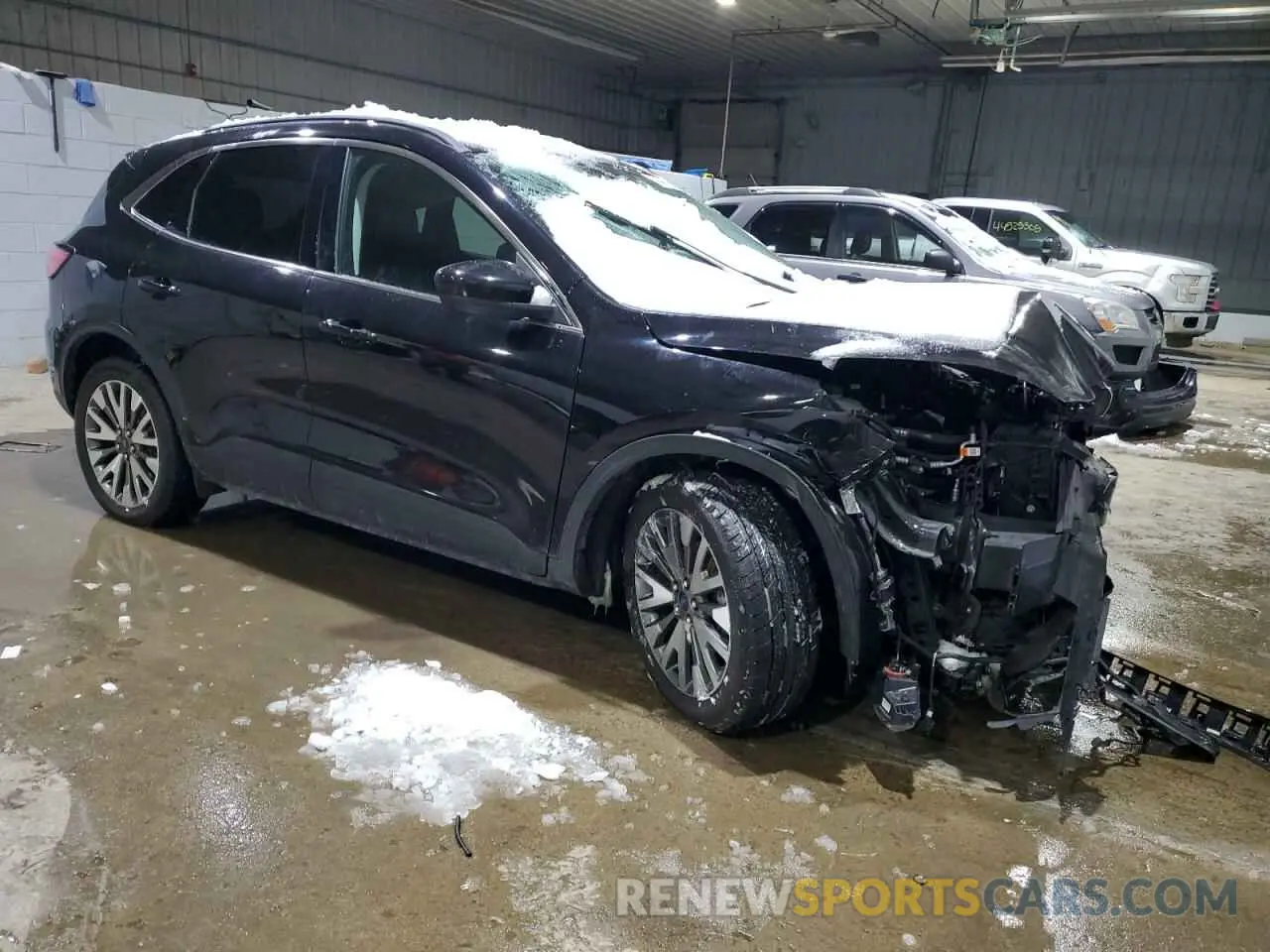 4 fotografías del automóvil dañado 1FMCU9J91MUA57451 FORD ESCAPE 2021