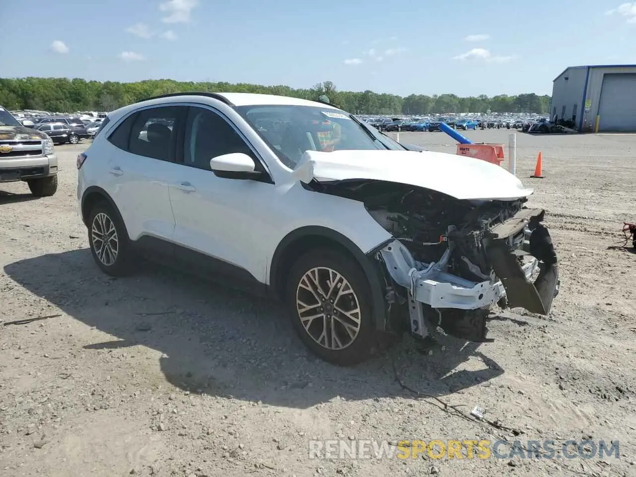 4 fotografías del automóvil dañado 1FMCU0H64NUB09454 FORD ESCAPE 2022