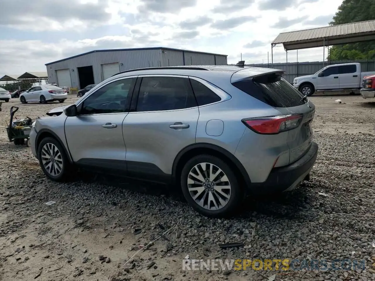 2 fotografías del automóvil dañado 1FMCU9DZ0NUA06522 FORD ESCAPE 2022