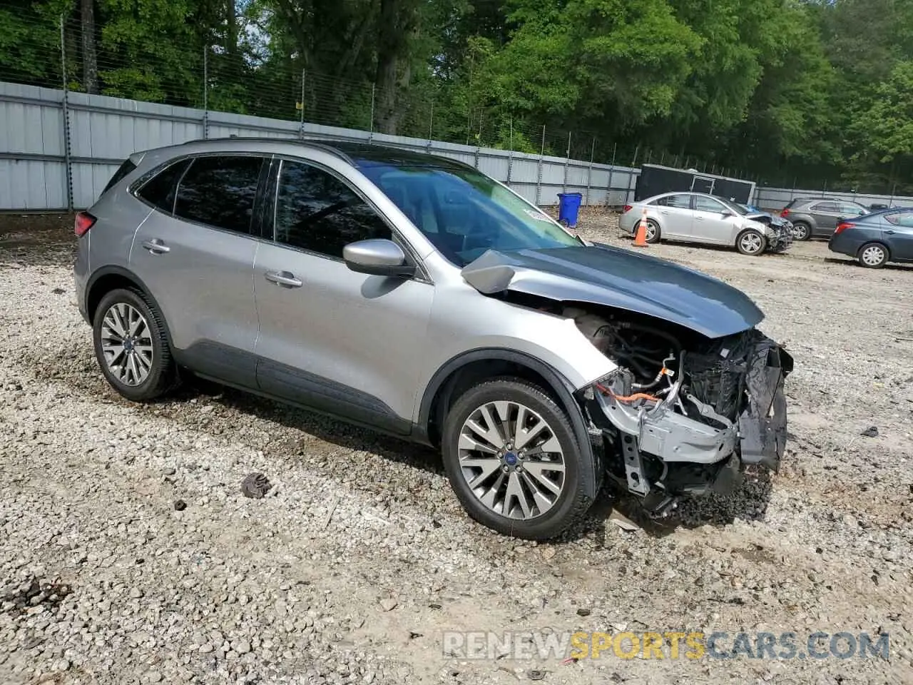 4 fotografías del automóvil dañado 1FMCU9DZ0NUA06522 FORD ESCAPE 2022