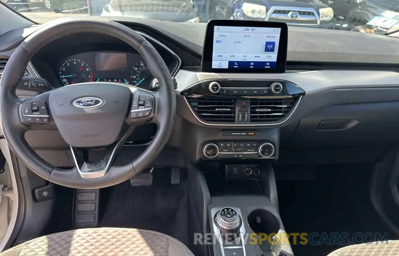 9 fotografías del automóvil dañado 1FMCU9G67NUA11993 FORD ESCAPE 2022