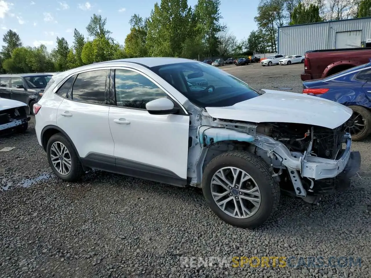 4 fotografías del automóvil dañado 1FMCU9H63NUA72708 FORD ESCAPE 2022
