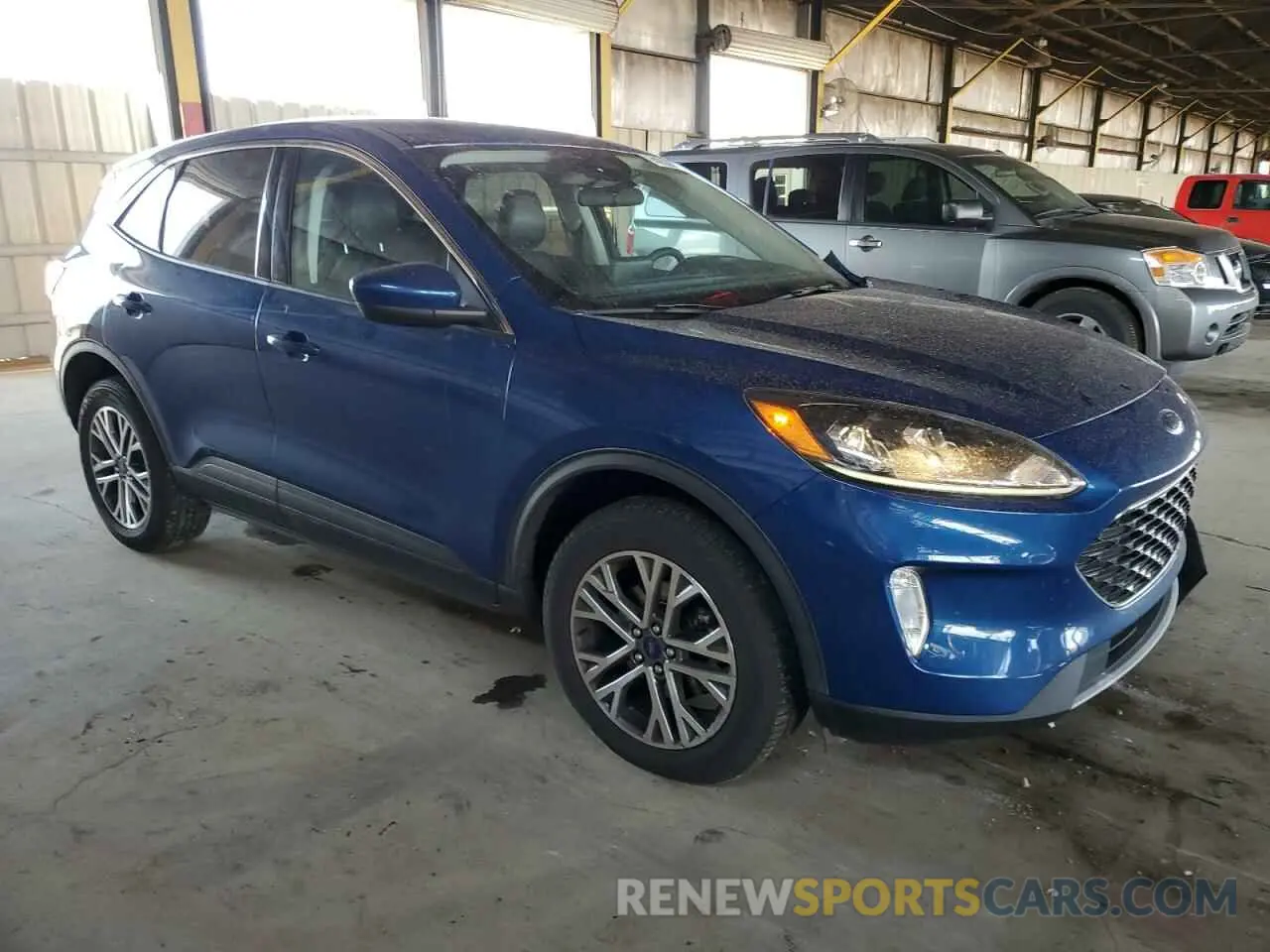 4 fotografías del automóvil dañado 1FMCU9H6XNUA71748 FORD ESCAPE 2022