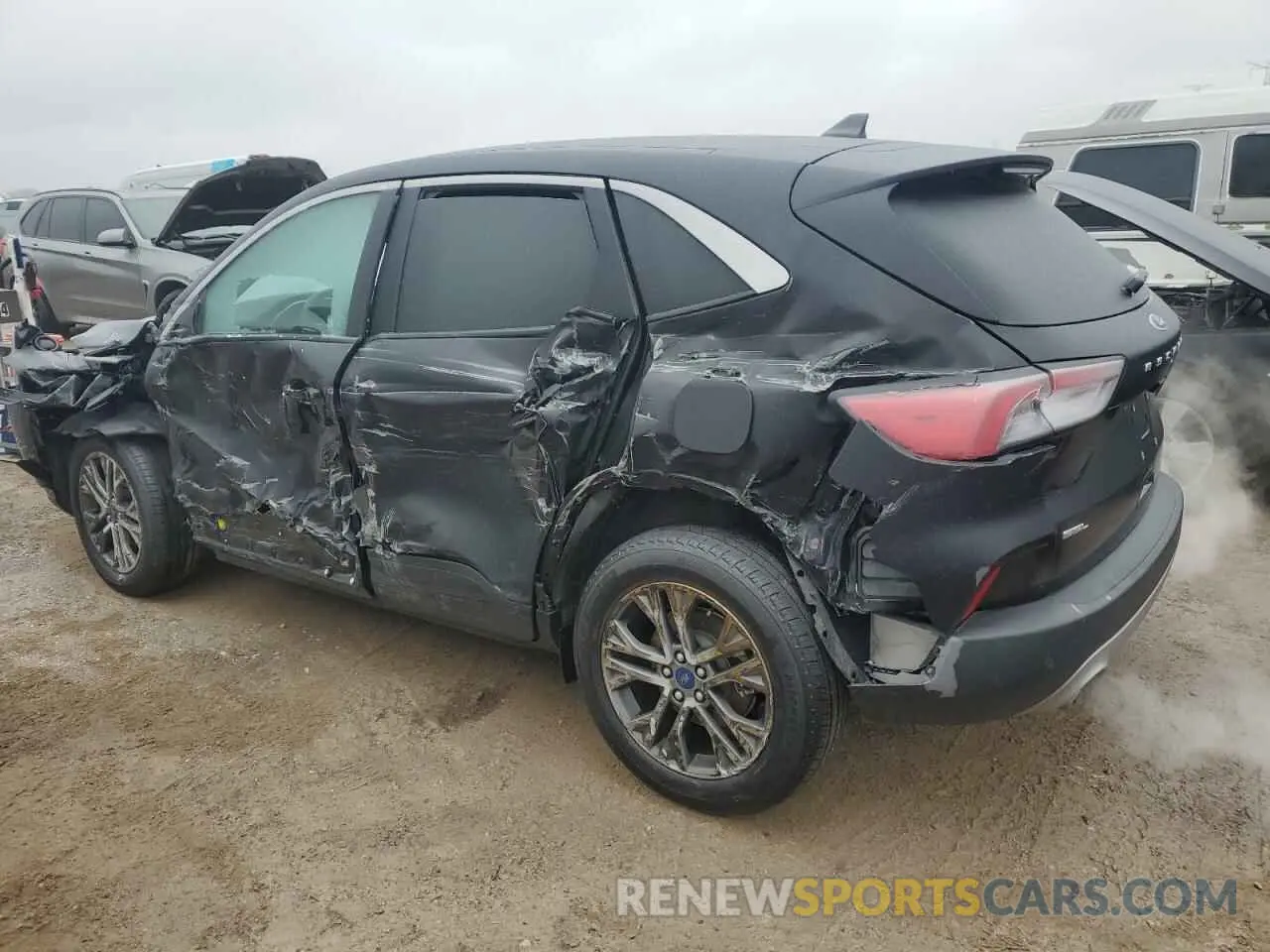2 fotografías del automóvil dañado 1FMCU9H90NUA75544 FORD ESCAPE 2022