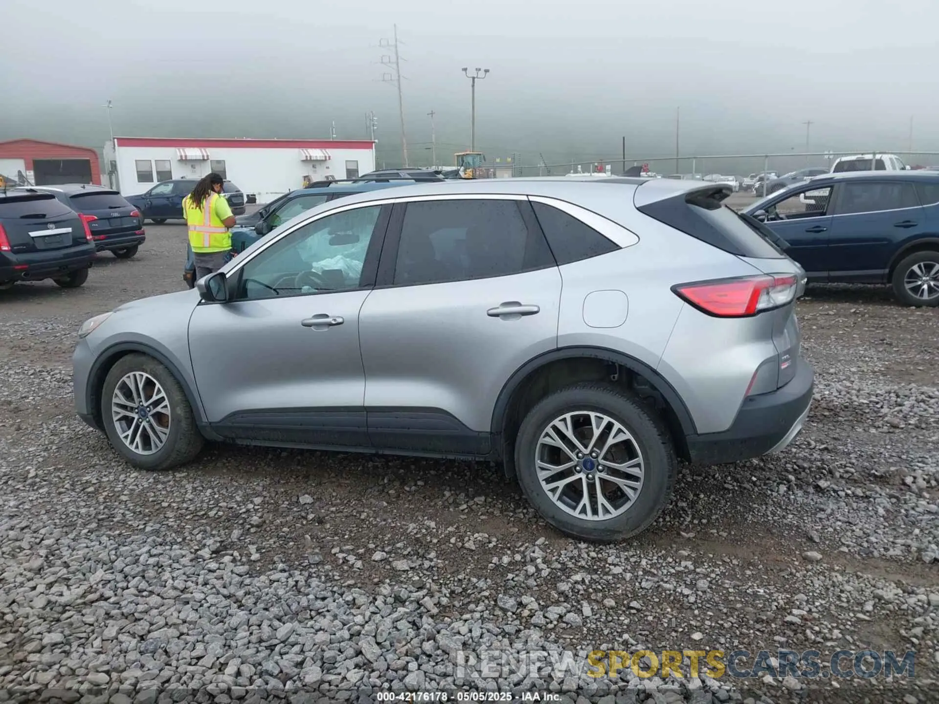 14 fotografías del automóvil dañado 1FMCU9H94NUA10776 FORD ESCAPE 2022