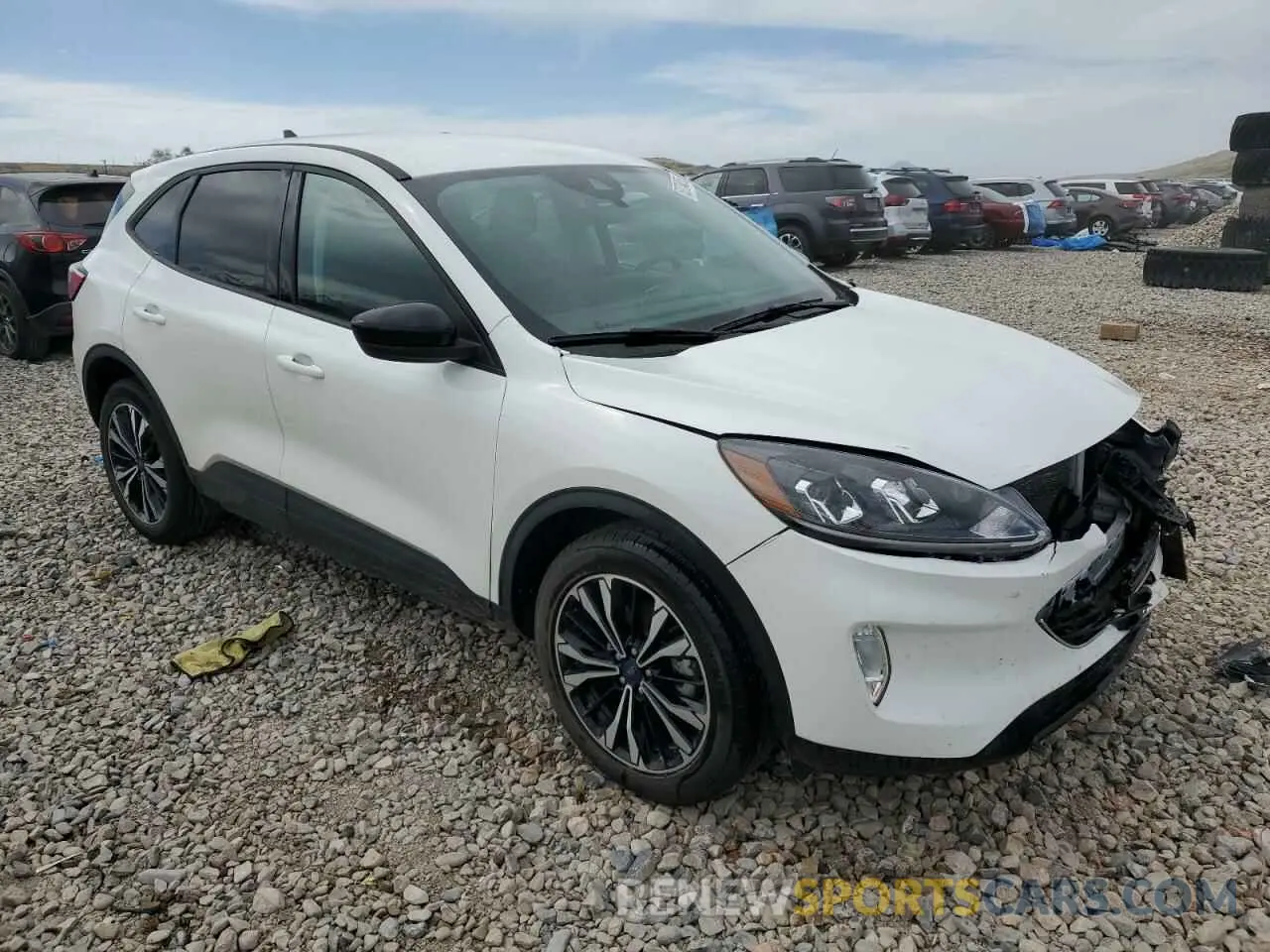 4 fotografías del automóvil dañado 1FMCU9H97NUB11763 FORD ESCAPE 2022