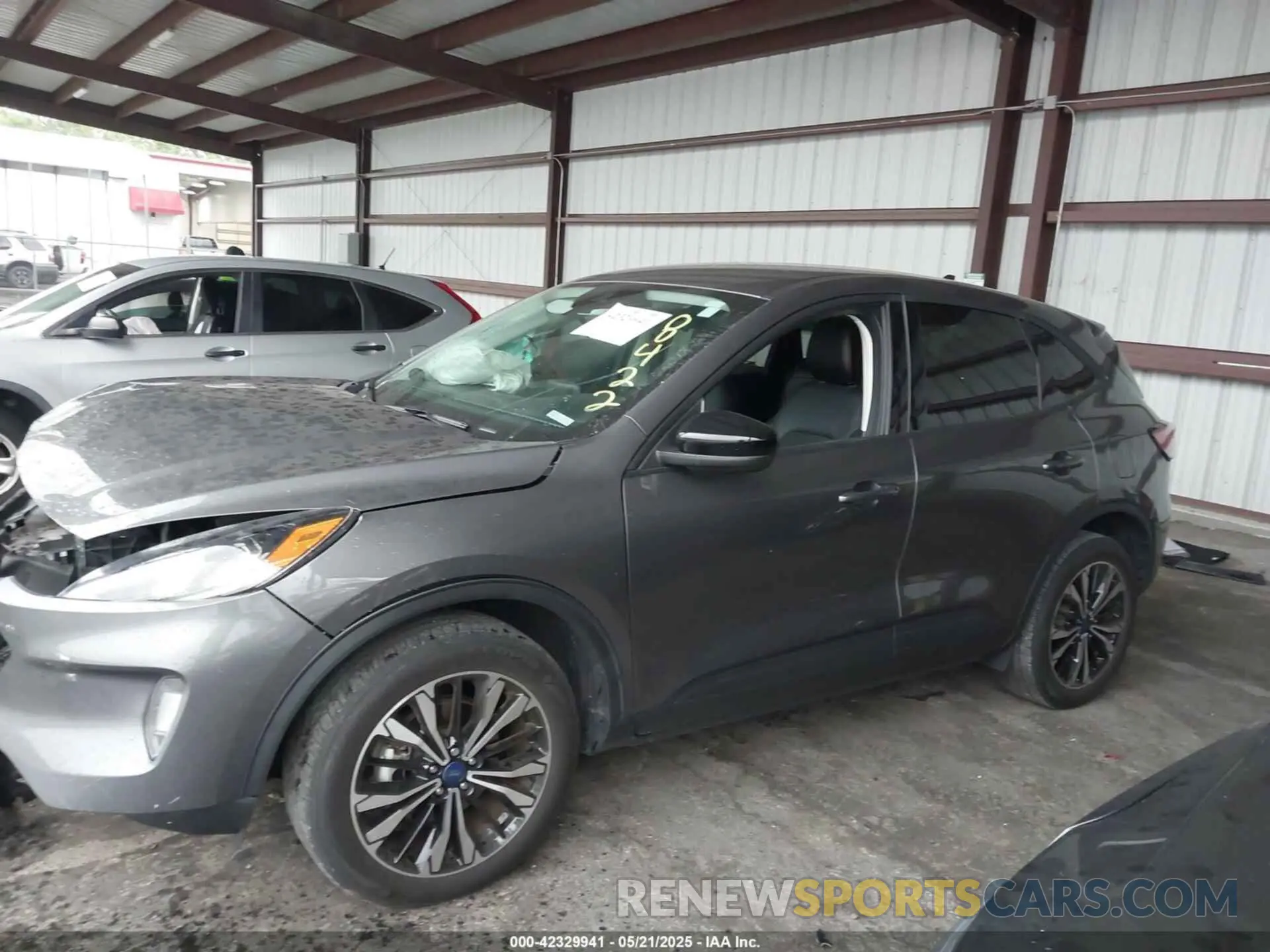 14 fotografías del automóvil dañado 1FMCU9H99NUB98422 FORD ESCAPE 2022