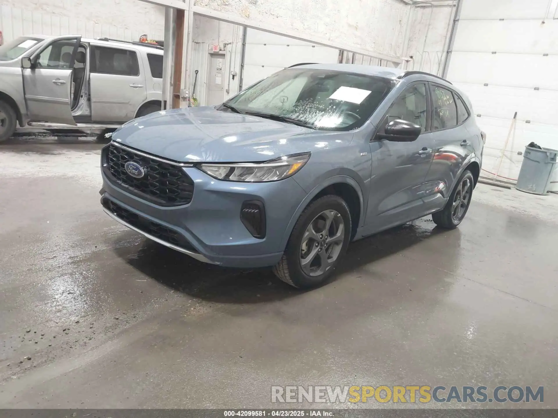 2 fotografías del automóvil dañado 1FMCU9MN0PUA57910 FORD ESCAPE 2023