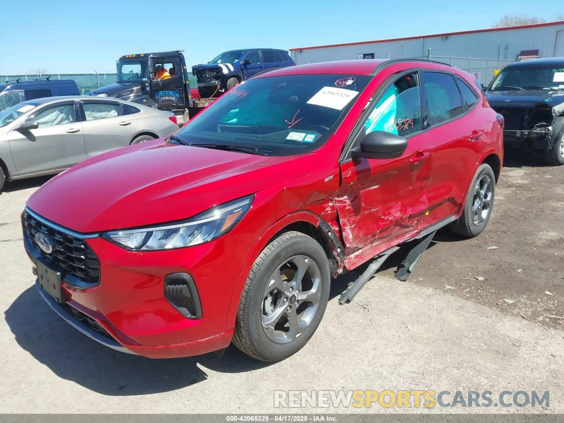 2 fotografías del automóvil dañado 1FMCU9MN2PUB28279 FORD ESCAPE 2023