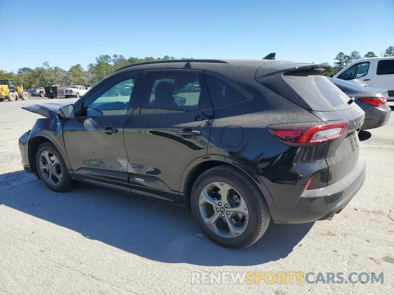 2 fotografías del automóvil dañado 1FMCU0MN6PUA23790 FORD ESCAPE ST 2023