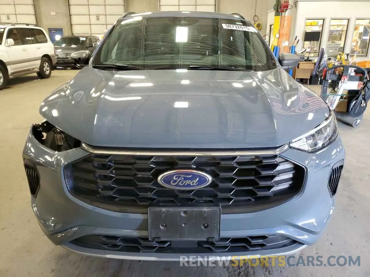 5 fotografías del automóvil dañado 1FMCU0MN8PUA99852 FORD ESCAPE ST 2023