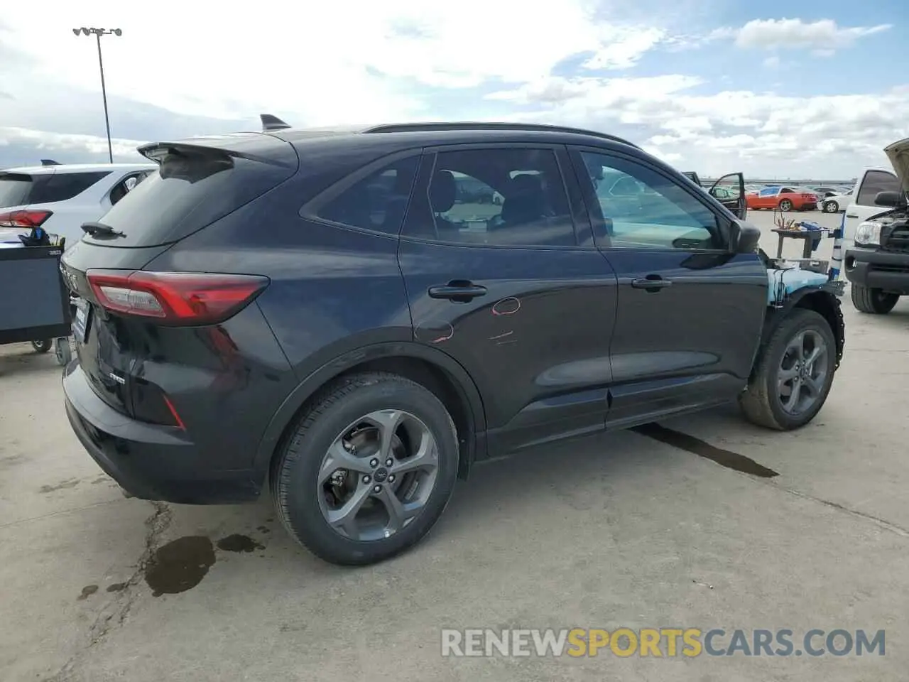 3 fotografías del automóvil dañado 1FMCU9MN6PUA33689 FORD ESCAPE ST 2023
