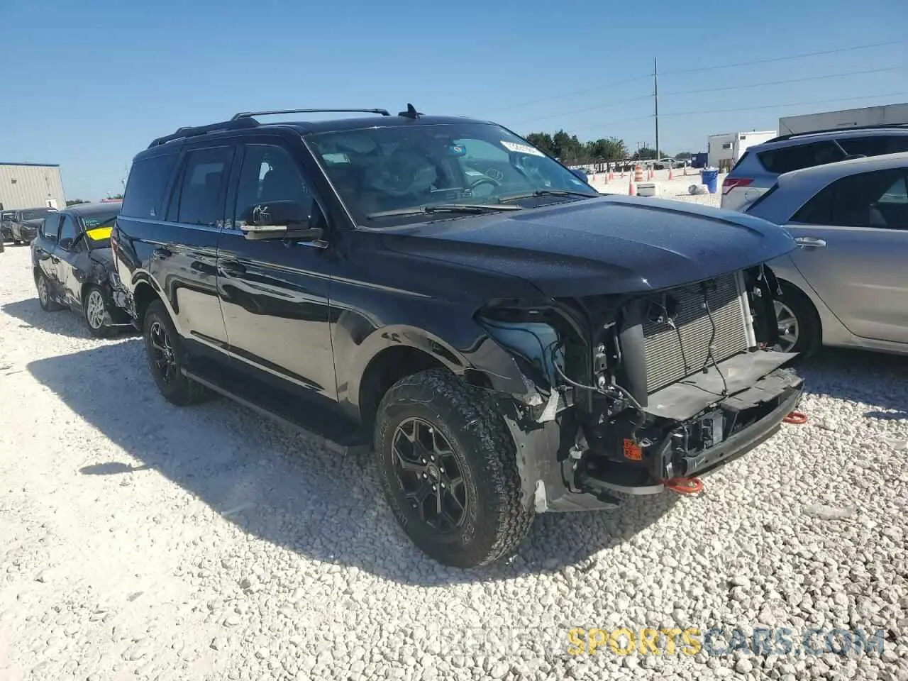 4 fotografías del automóvil dañado 1FMJU1RT1NEA03975 FORD EXPEDITION 2022