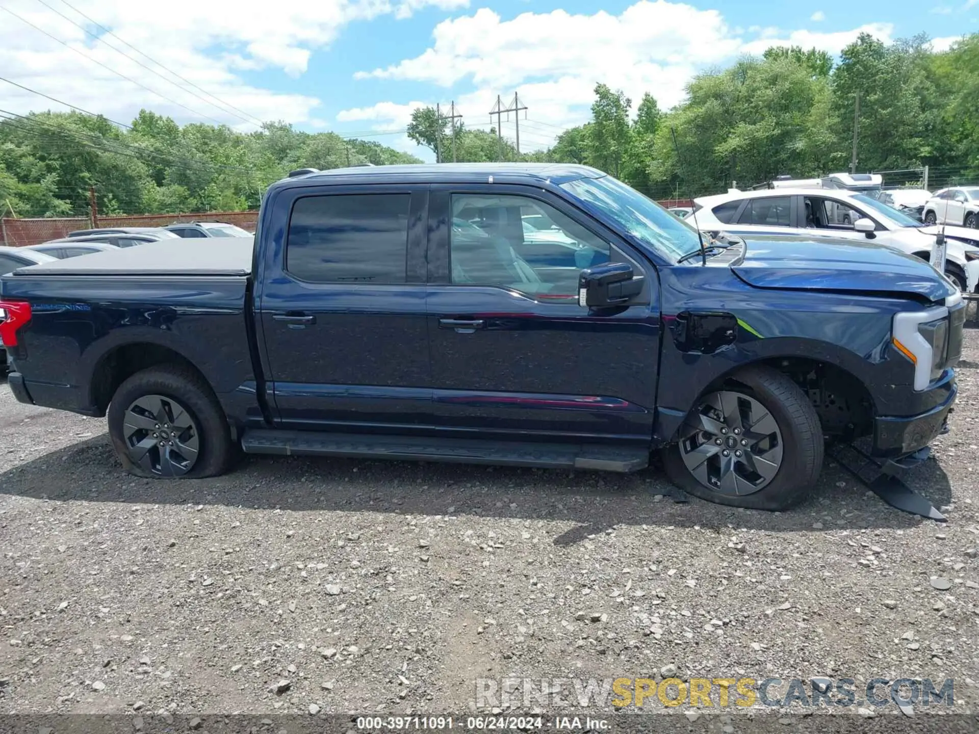 13 fotografías del automóvil dañado 1FT6W1EVXPWG42428 FORD F-150 LIGHTNING 2023