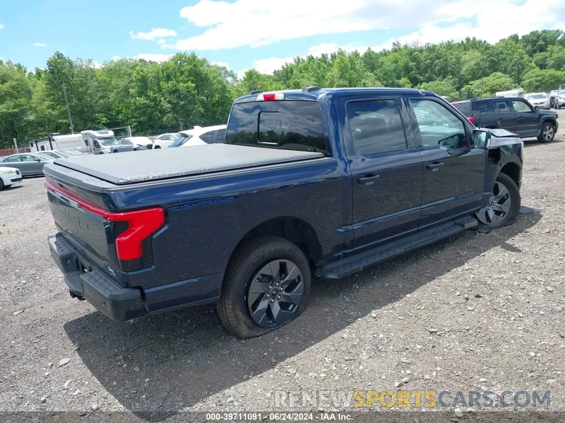 4 fotografías del automóvil dañado 1FT6W1EVXPWG42428 FORD F-150 LIGHTNING 2023