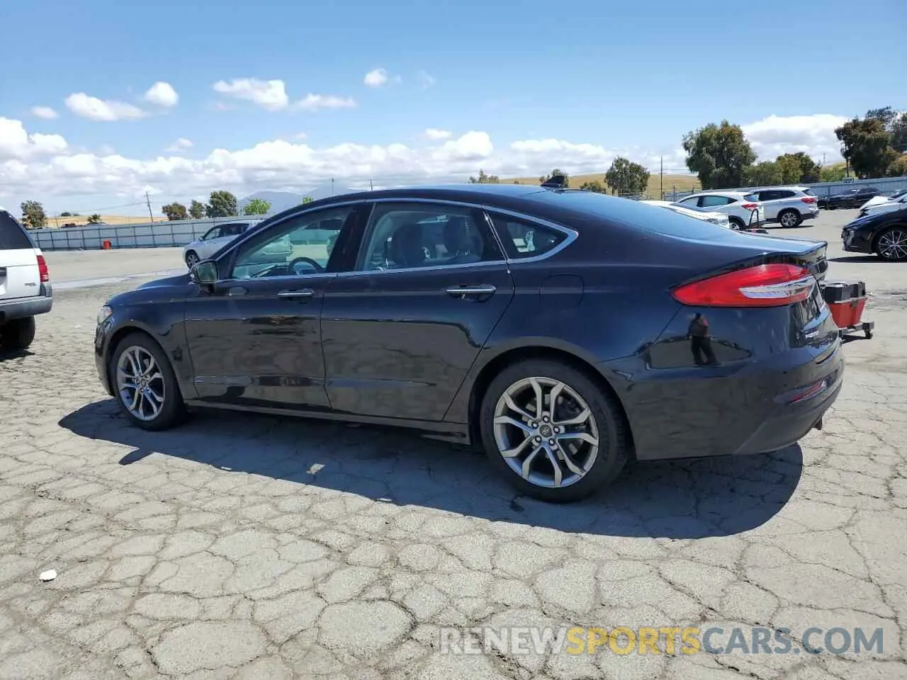2 fotografías del automóvil dañado 3FA6P0CD5KR253151 FORD FUSION 2019