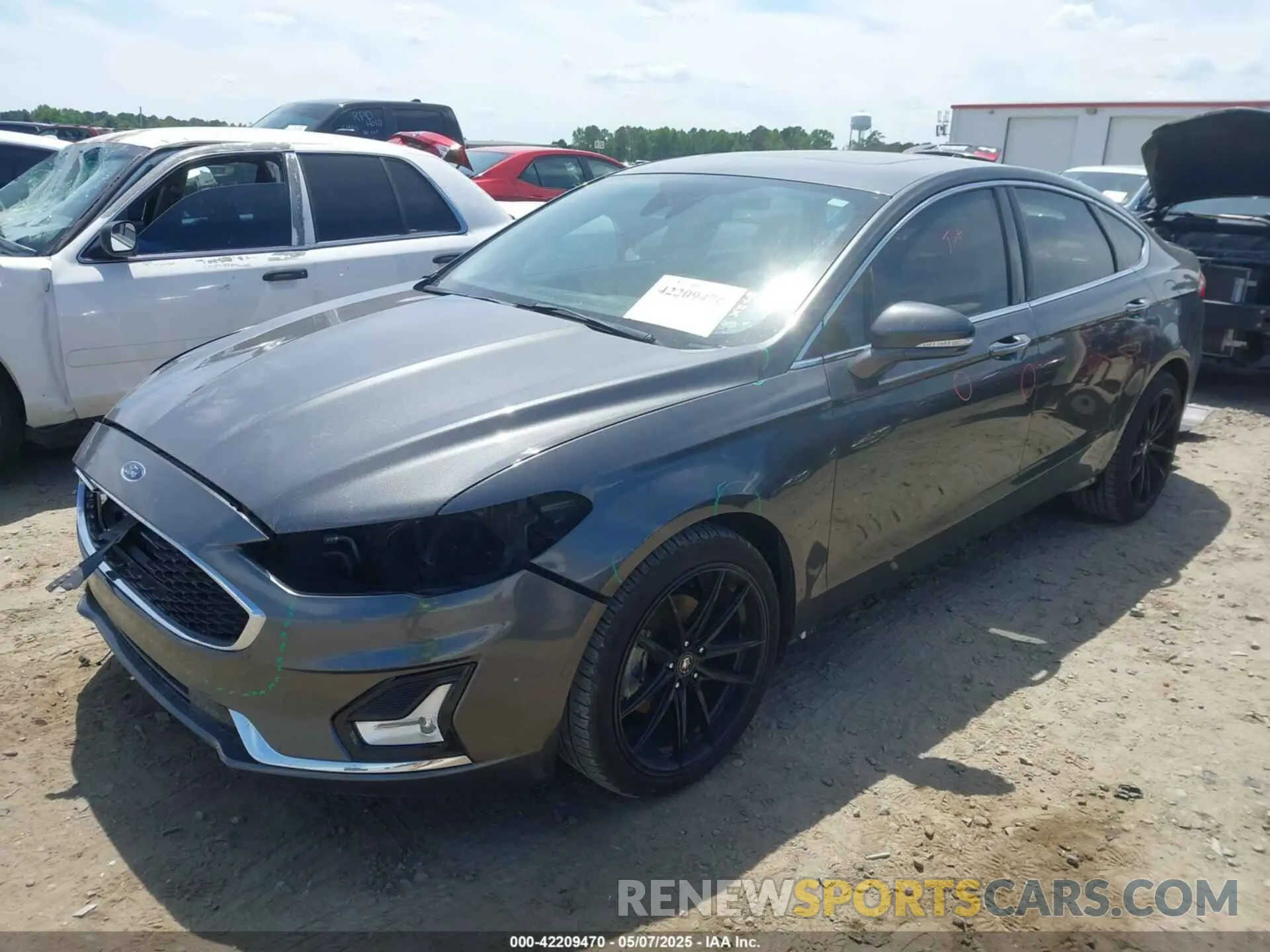 2 fotografías del automóvil dañado 3FA6P0D9XKR152617 FORD FUSION 2019