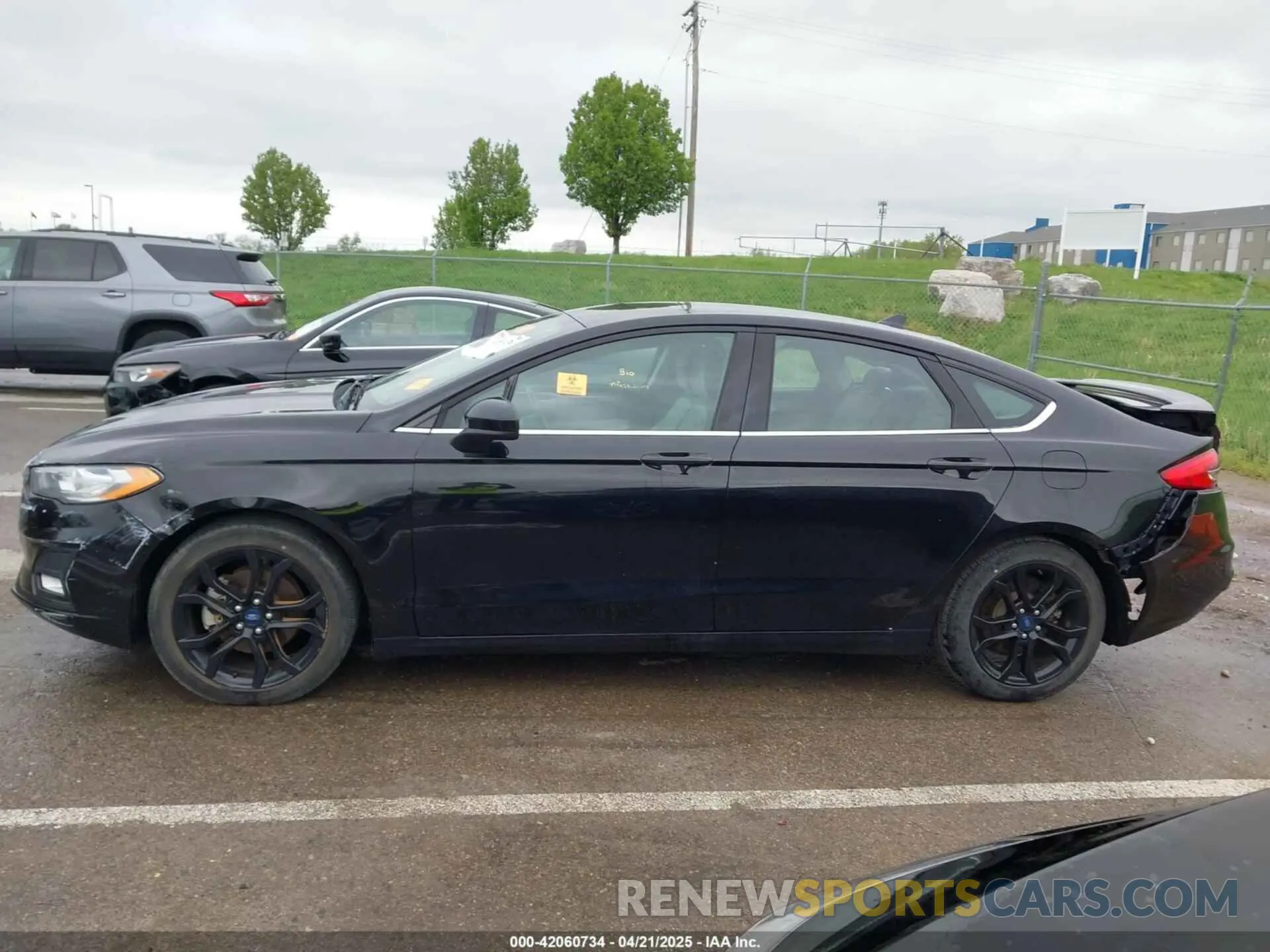 14 fotografías del automóvil dañado 3FA6P0HD8KR250818 FORD FUSION 2019